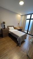 Novo Quarto com varanda, Moderno e Aconchegante no centro da cidade - B&B Lavras