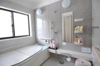 Camera Doppia con Letti Singoli con Futon e Bagno in Comune