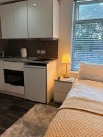 Studio with en suite, compact and comfortable for 1-2 people - Chambres d'hôtes Luton
