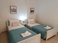 2 single beds - Chambres d'hôtes Livadiá
