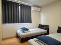 アパートメントホテル憩 - Chambres d'hôtes Yanagawa