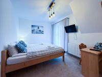 Doppel-/Zweibettzimmer mit Balkon