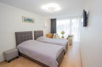 Tweepersoonskamer met 2 Aparte Bedden en Balkon