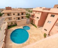 Modernes Apartment mit Poolblick & Balkon - B&B Marrakech