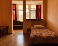 Dreibettzimmer mit Bergblick