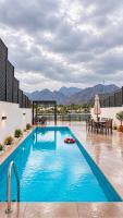 Azure Escape - Swimming Pool with Sea and Mountain view - Al Dana Island Fujairah - B&B Fujairah