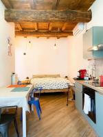 Ruti's House - Monolocale con travi a vista vicino Malpensa e Milano Rho Fiera - Chambres d'hôtes Gallarate
