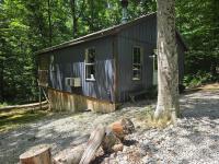 Owl's Tale at Avenwood Cabins - Chambres d'hôtes New Straitsville