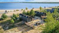 FUTOPIA Strandhäuser mit Seeblick, Sauna & Hot Tub - B&B Buschmühle