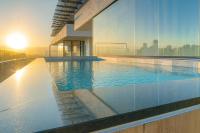 Modern Apartment in Arroyo Hondo with Pool Gym and Balcony - Chambres d'hôtes Saint Domingue