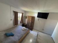 Apartamento al fondo de la casa - B&B Villa de Fray Bentos