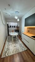 уютная квартира в отличном районе - B&B Karakol