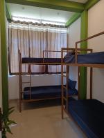 Cama individual en habitación compartida mixta