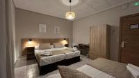 Chambre Triple avec Salle de Bains Commune