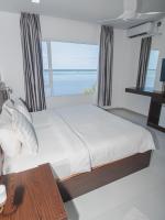 Kamer met Kingsize Bed en Uitzicht op Zee