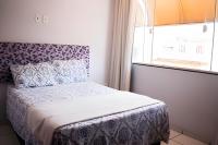 Casa 2 quartos com Ar Cond. a 2 quadras da praia. - Chambres d'hôtes Arraial do Cabo