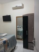 Casa com ótima localização, composta por 2 quartos, com ar-condicionado nos dois quartos, além de garagem para carro hatch de pequeno porte - Ferienwohnung Petrolina