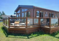 Bluebell Luxury Lodge with Pond View and Large Wraparound Decking at Southview - B&B Skegness