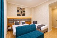 Deluxe Dreibettzimmer