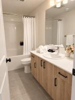 Modern 2BR Retreat King Bed Heated Bath Floors - B&B Edmonton