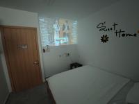 Zimmer mit Queensize-Bett