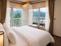 Chambre Deluxe (2 Adultes + 1 Enfant)