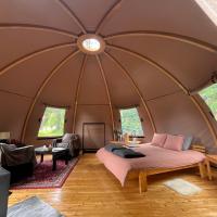 Romantic night in a dome tent lake view - B&B Bjuråker