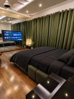 Serenity Studio Apartments Bahria Town - Chambres d'hôtes Lahore