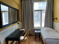 Large apartment in a 19th-century wooden house in the center of Hanko - Ferienwohnung Hanko