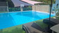Tropical Pool & Garden Retreat - Explore the Underground River - Bed and Breakfast Puerto Princesa City