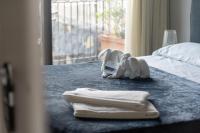 Habitación Doble con balcón (2 adultos + 1 niño)