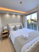 Modern Oasis 2BR Netflix and Pool - Chambres d'hôtes Manille