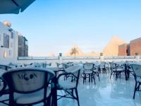 Céline Pyramids View - B&B Cairo