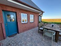 Kapitänshaus Meerblick - Bed and Breakfast Langeneß