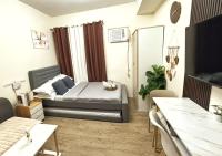 AGFam Condo Bliss by Fullerton Suites - Bed and Breakfast Silang
