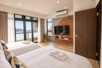 Chambre Lits Jumeaux Deluxe - Vue sur Mer