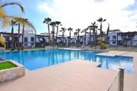 Oasis Beach - Sunny Poolside Apartment by La Zenia - Chambres d'hôtes Urbanizacion los Balcones