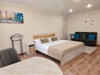 Светлые и уютные апартаменты с выходом в центральный парк - B&B Kostanay