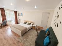 Светлые и уютные апартаменты с выходом в центральный парк - B&B Kostanay