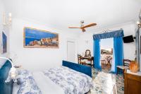 Doppelzimmer mit Balkon und Meerblick