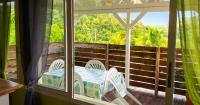 Maison douce à Rivière-Salée avec vue sur jardin & montagne - B&B Rivière Salée