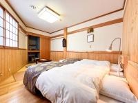 Tweepersoonskamer met 2 Aparte Bedden en Badkamer