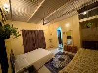 Chambre Deluxe (2 Adultes + 1 Enfant)