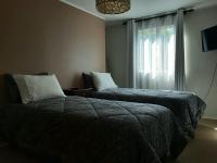 Tweepersoonskamer met 2 Aparte Bedden