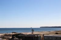 Dreibettzimmer mit Meerblick