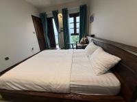 Zimmer mit Queensize-Bett und Meerblick