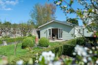 Deluxe Doppel-/Zweibettzimmer mit Gartenblick