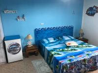 Habitación Triple con vistas al jardín