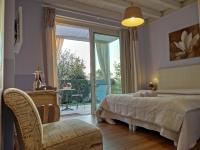 Superior Doppelzimmer mit Zustellbett und Gartenblick
