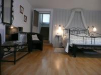 Habitación Triple con vistas al jardín